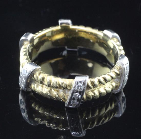 A late 1960s Kutchinsky 18ct gold and diamond double ropetwist band ring, size M.